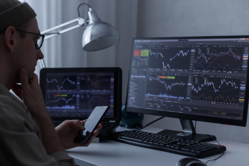 Trader analyzing SPX options charts and market data